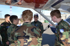 Lt. Moore explains the finer points of the exterior pre-flight check procedure.