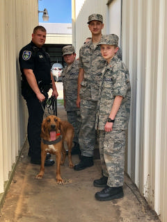 sheriff's deputy with dog and cadets