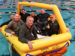 Members in life raft