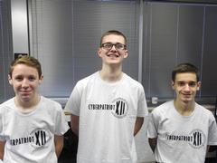 3 cadets in CyberPatriot shirts