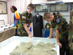 looking at CAP uniforms in the Dare County Airport Museum. 
