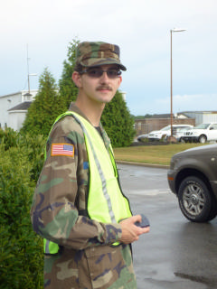 C/CMSgt James Medlin counting incoming vehicles while on parking detail