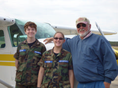 Big smiles from C/Amn Travis Jackson and C/Amn Nicole Reason after their flight with EAA pilot Donnie Boyette.