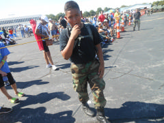 C/SrAmn Freddy DePaz stays hydrated while performing flight line security.