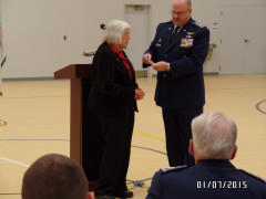 Col David Crawford presents CAP’s Congressional Gold Medal to Mrs. Patricia Whinnery Barber on Jan. 7, 2015.
