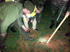 State Park Ranger Jack Singley and CAP cadets measure footprints