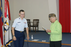 C/MSgt. David Vermillion receives his award from VFW Commander Sue Lamm-Gurley