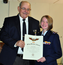 C/1st Lt Hannah Phillips receives the Billy Mitchell Award from Lt Col Ron Cheek, Group 4 Commander